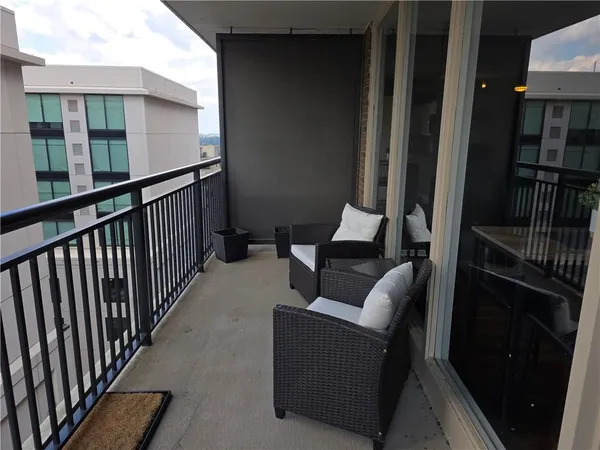 a balcony with furniture