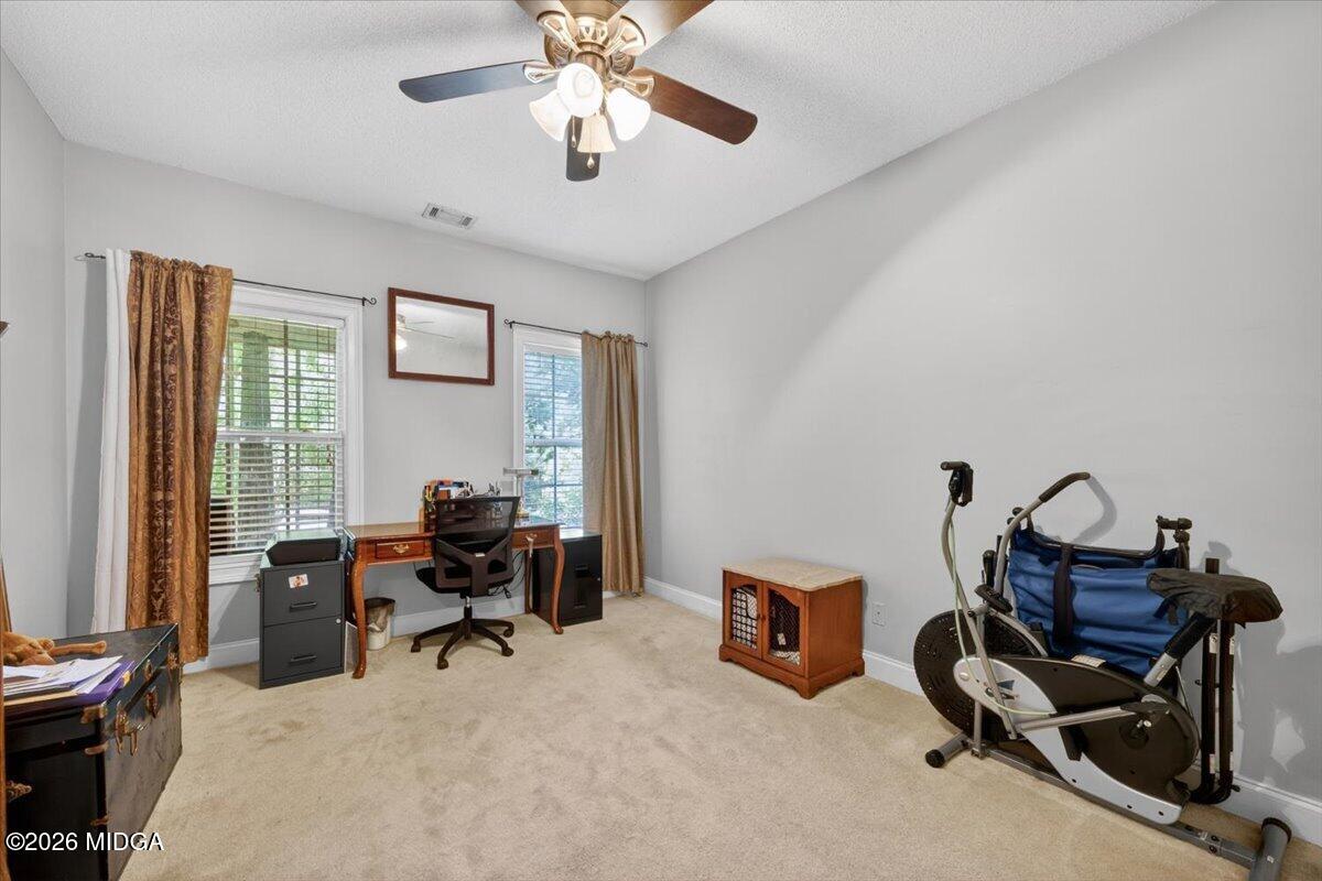 619 Grayridge Road Gray, GA 31032 - Photo 26 of 40 a view of a workspace with furniture and a window