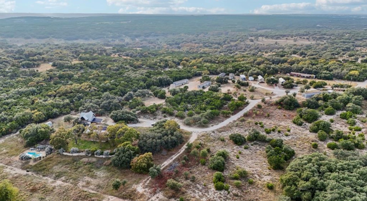 24369-2 Bingham Creek Road, Unit 1 Leander, TX 78641 - Photo 14 of 17 a view of a big yard with lots of green space
