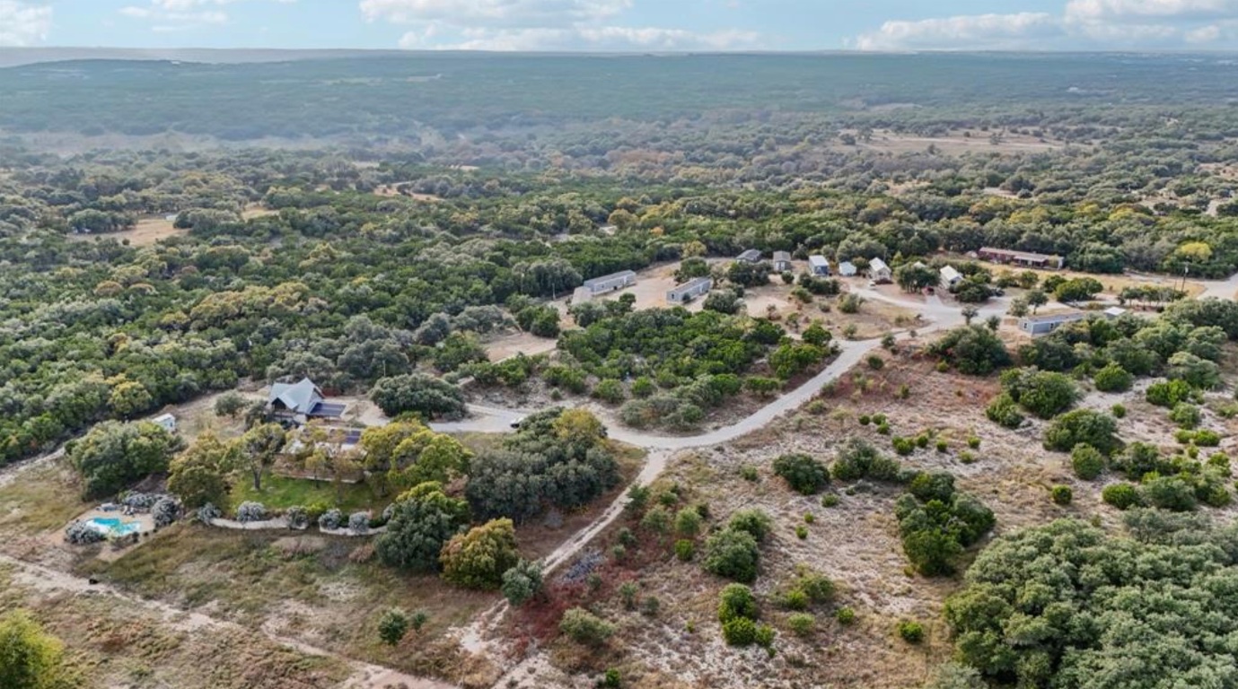 24369-2 Bingham Creek Road, Unit 1 Leander, TX 78641 - Photo 3 of 17 a view of a big yard with lots of green space