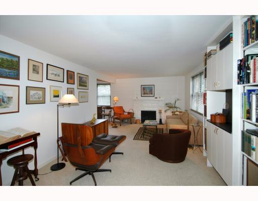 124 Virginia Road Pittsburgh, PA 15237 - Photo 2 of 17 Living Room. BRIGHT LIVING ROOM WITH BUILT-INS, BRICK FIREPLACE AND NEUTRAL DECOR