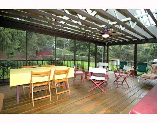 124 Virginia Road Pittsburgh, PA 15237 - Photo 11 of 17 Patio/Deck. REAR SCREENED PORCH WITH SKY LIGHTS OVERLOOKING PRIVATE LEVEL REAR YARD WITH SHED