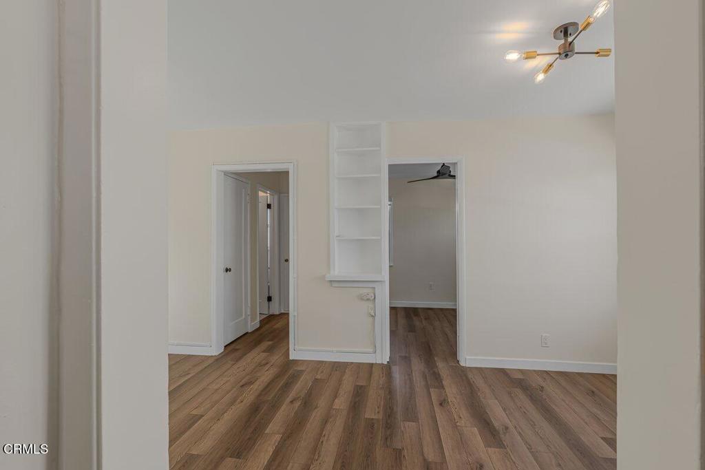 6131 Ranchito Avenue Los Angeles, CA 91401 - Photo 6 of 12 a view of empty room with wooden floor