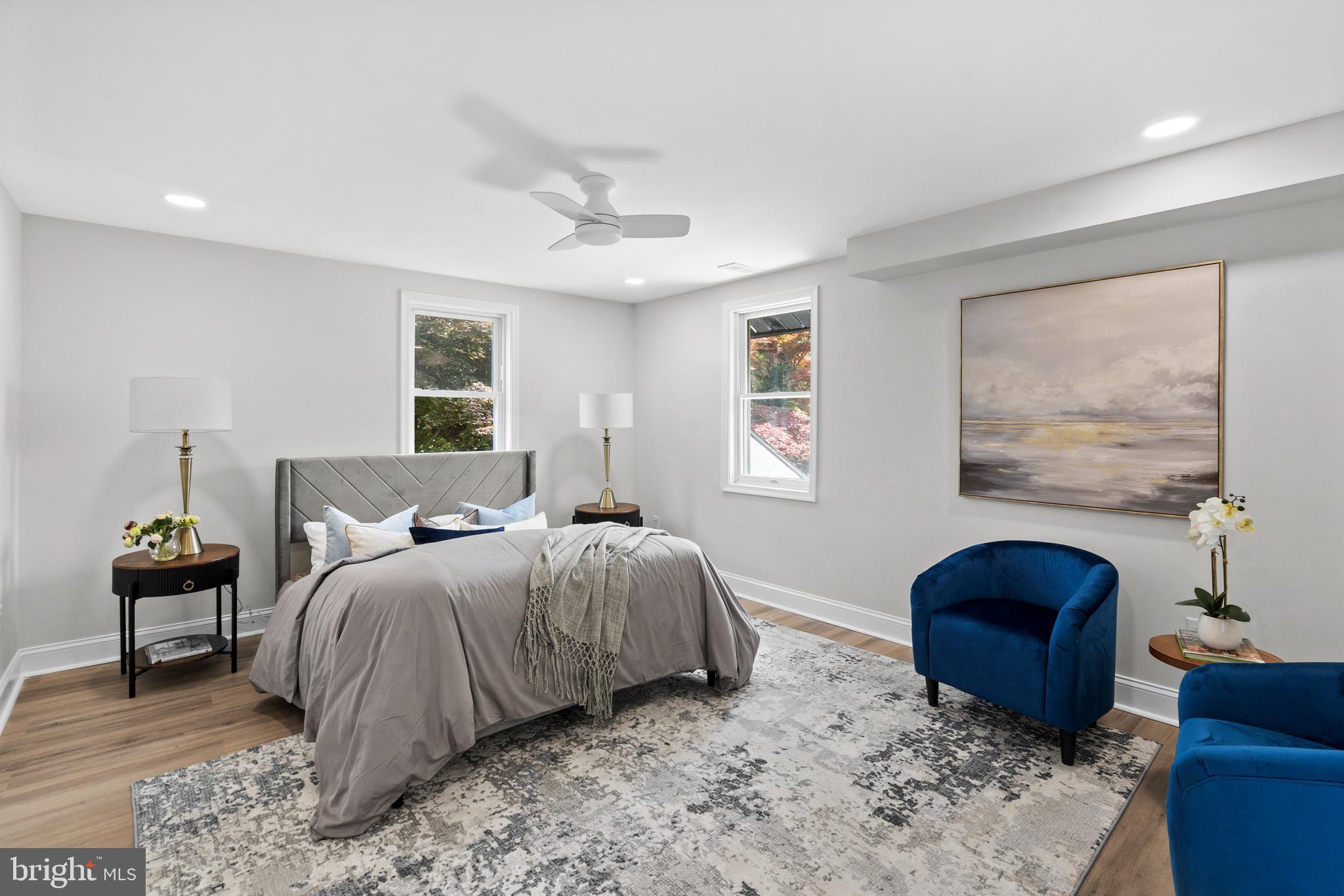 1082 Edge Hill Road Abington, PA 19001 - Photo 21 of 37 a bedroom with a bed a couch and a window