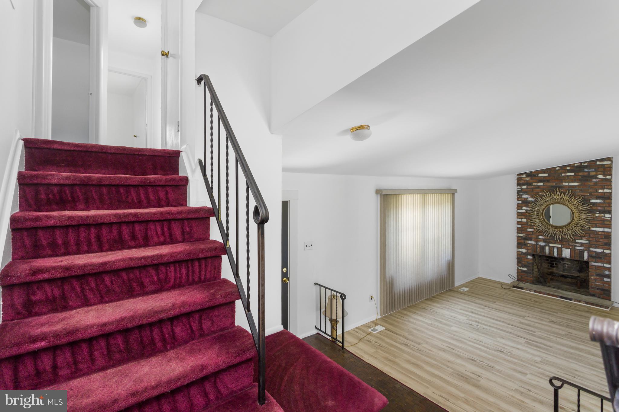 12 Kingsley Road Mount Holly, NJ 08060 - Photo 20 of 32 a view of a livingroom with furniture and staircase
