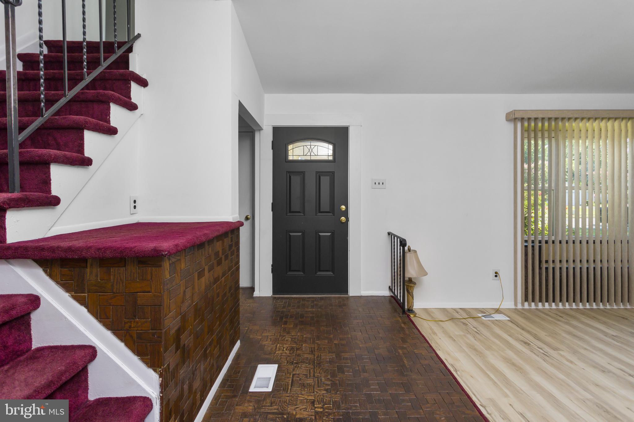 12 Kingsley Road Mount Holly, NJ 08060 - Photo 6 of 32 a view of a livingroom with furniture and stairs