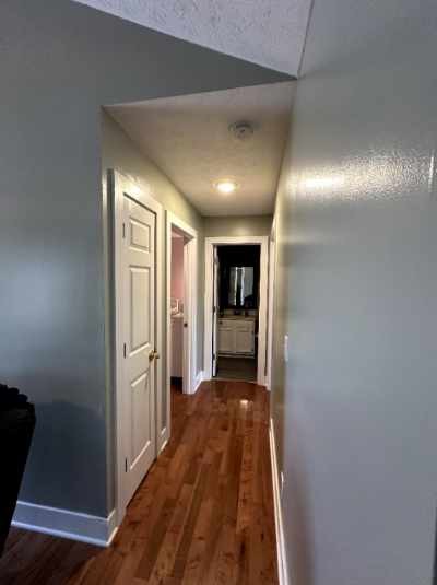 882 Pleasant Hill Road Franklin, KY 42134 - Photo 9 of 16 a view of a hallway with wooden floor