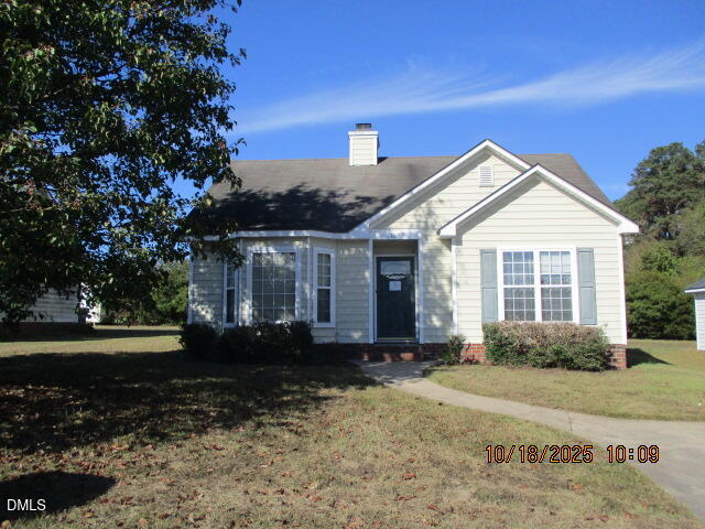 1616 Greys Mill Road Rocky Mount, NC 27804 - Photo 5 of 9 a front view of a house with a yard