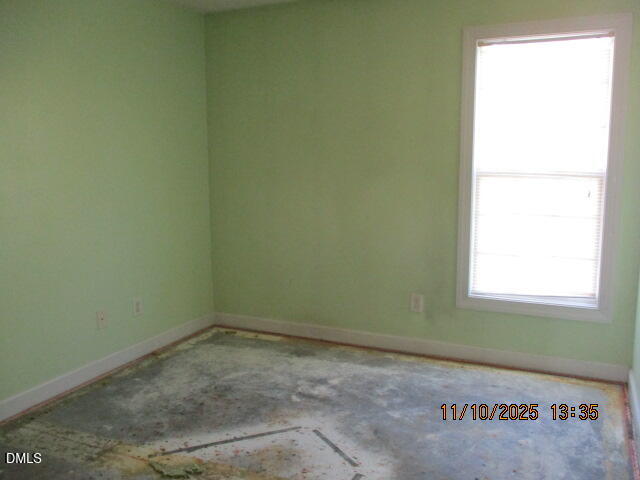 1616 Greys Mill Road Rocky Mount, NC 27804 - Photo 6 of 9 a view of a room that has a window in it