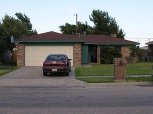 5341 Capulin Lane Amarillo, TX 79110 - Photo 1 of 1 a car parked in front of a house