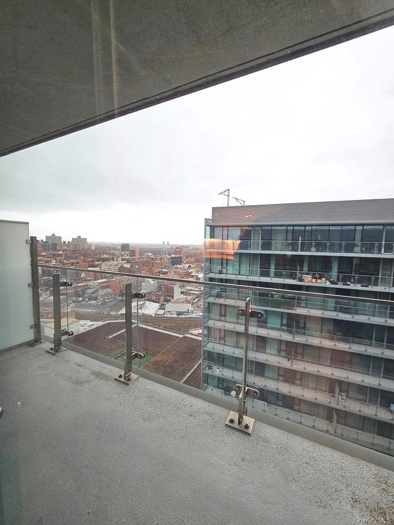 131-03 40 Road, Unit PH1Y Queens, NY 11354 - Photo 5 of 13 a view of a terrace with city view