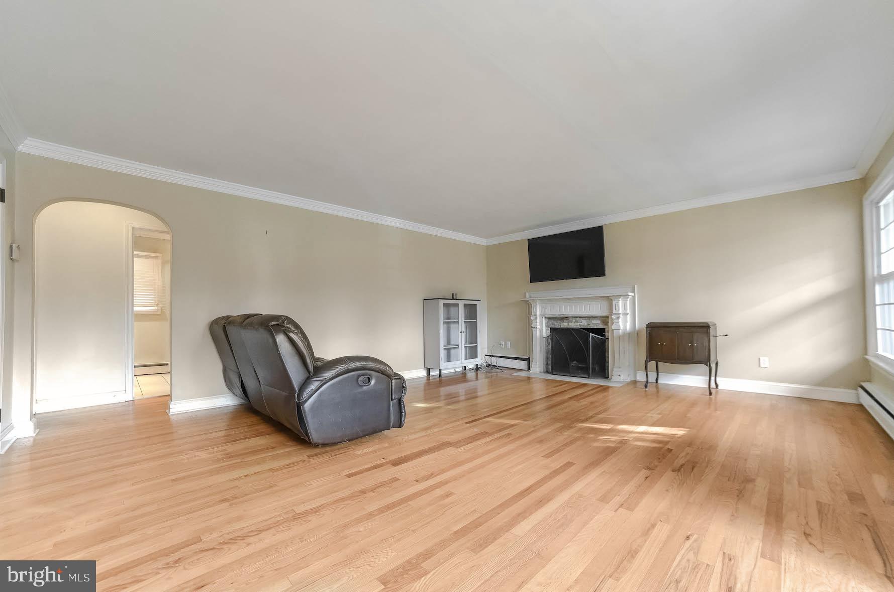 46044 Rolling Road Lexington Park, MD 20653 - Photo 6 of 31 Living Room; showcasing charming archway