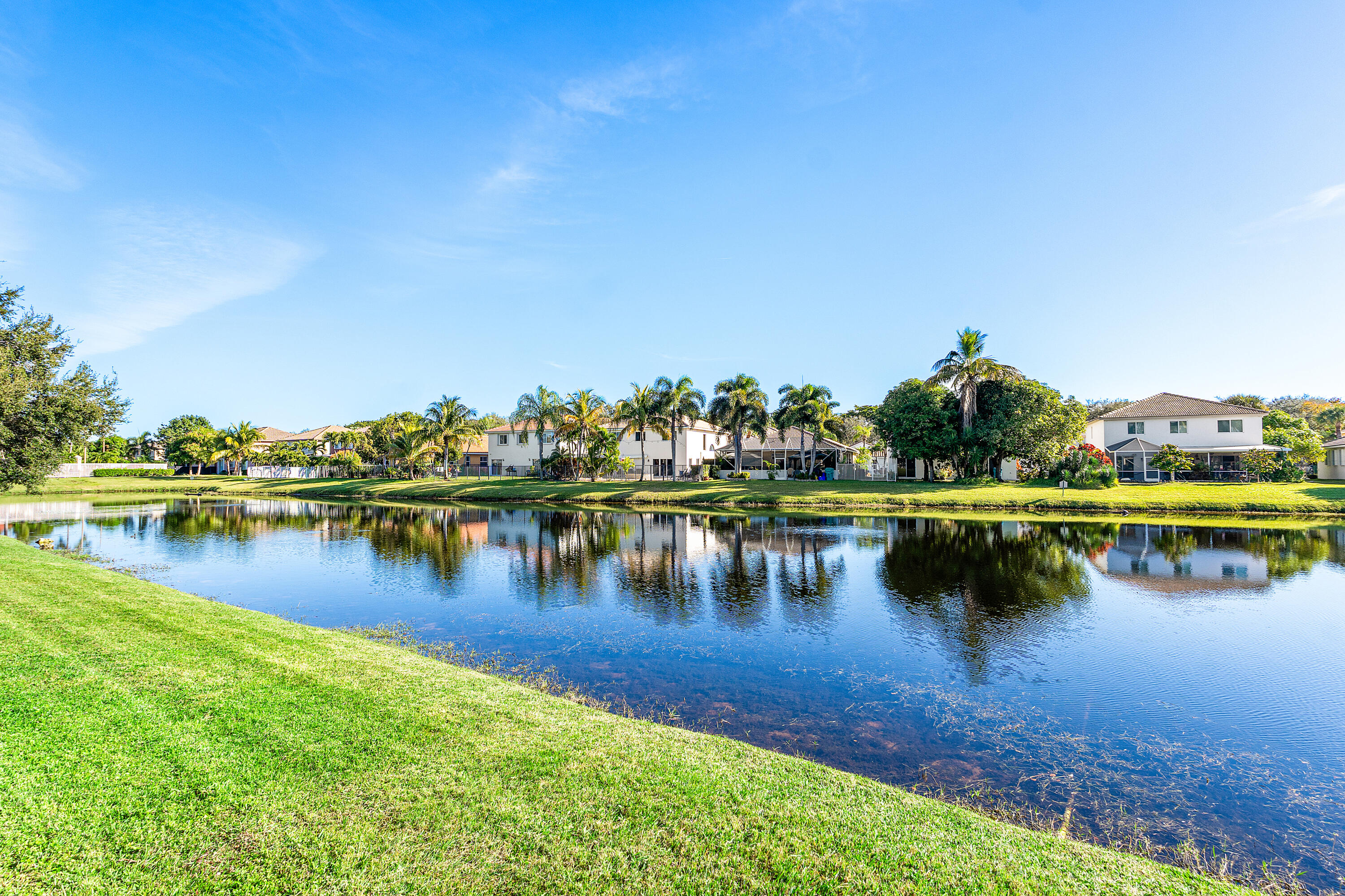 1135 Rialto Drive Boynton Beach, FL 33436 - Photo 51 of 54 a view of a lake with houses with outdoor space