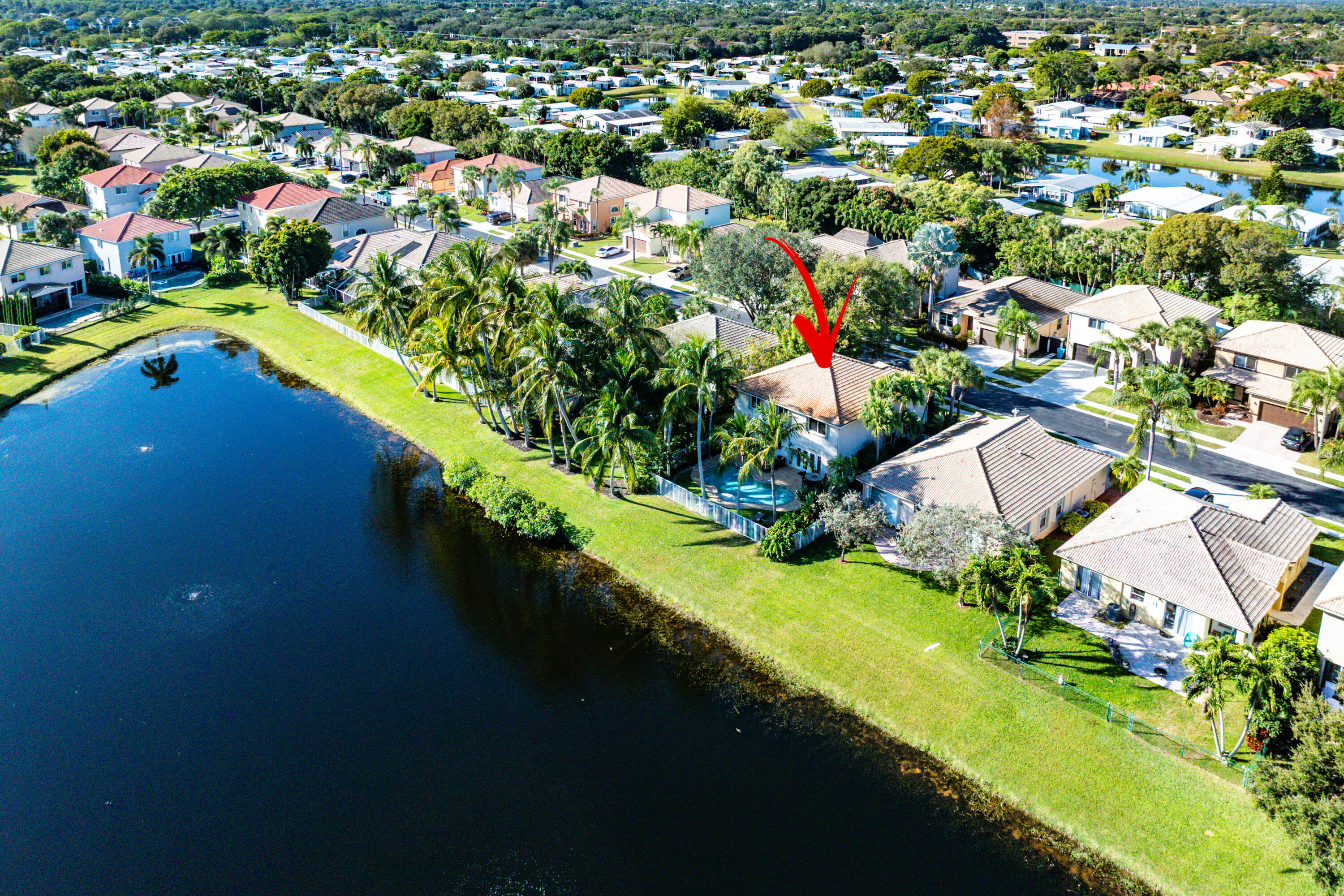 1135 Rialto Drive Boynton Beach, FL 33436 - Photo 53 of 54 an aerial view of residential houses with outdoor space and swimming pool