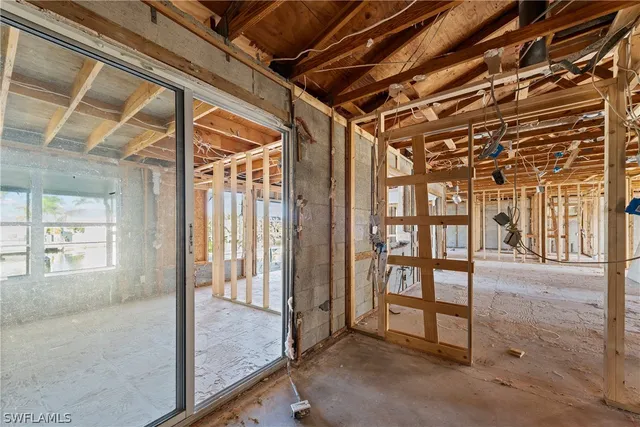 a view of a room with large windows