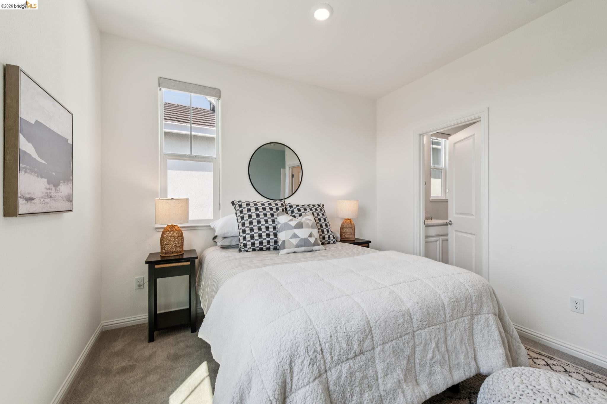 24157 Amaranth Loop Hayward, CA 94541 - Photo 45 of 63 Bright bedroom featuring a single window, white walls, and gray carpet flooring