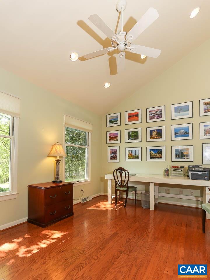 590 Explorers Road Charlottesville, VA 22911 - Photo 17 of 50 a living room with furniture and two window