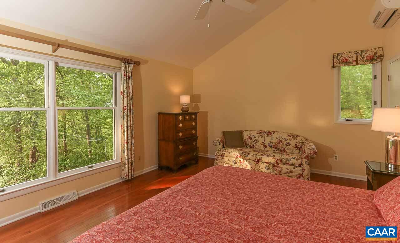 590 Explorers Road Charlottesville, VA 22911 - Photo 20 of 50 a bedroom with a bed window and a bed
