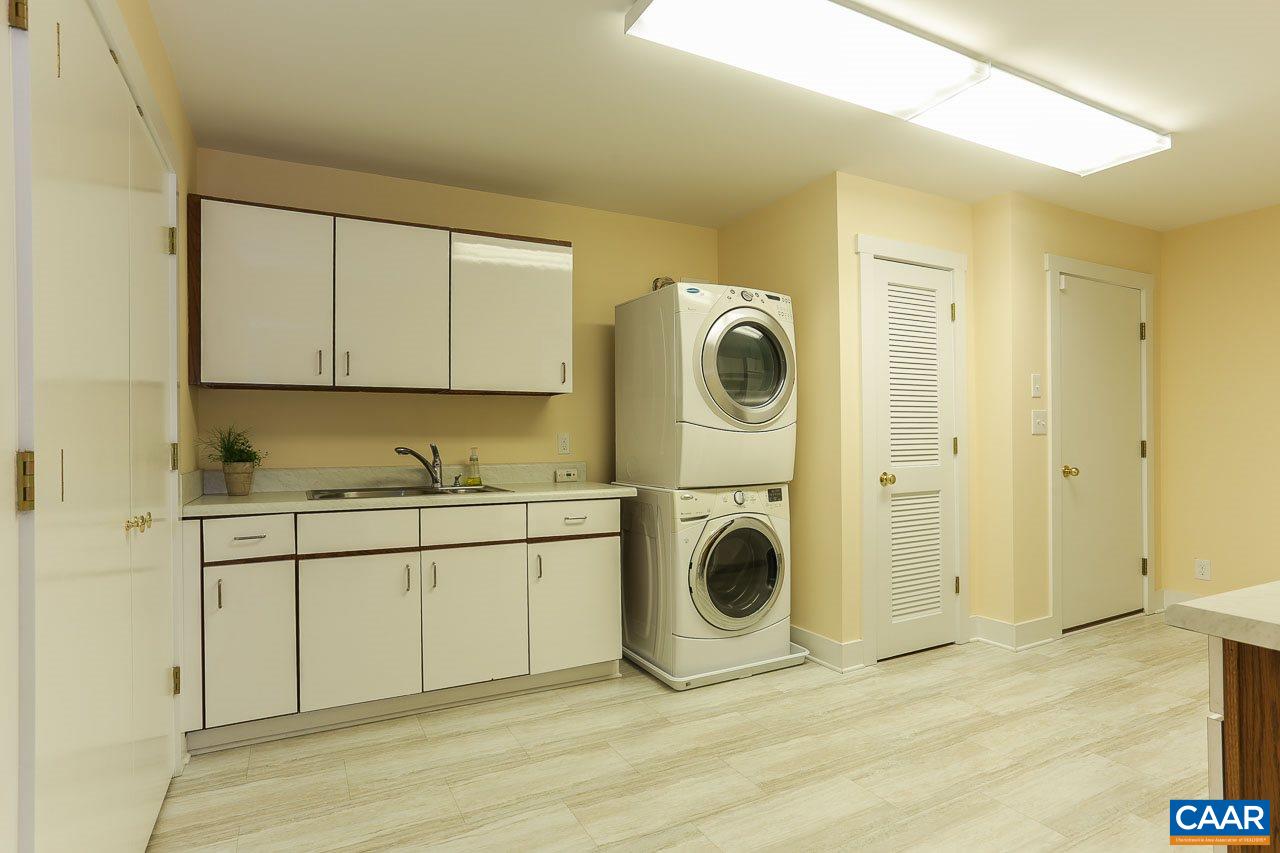 590 Explorers Road Charlottesville, VA 22911 - Photo 31 of 50 a view of a kitchen with washer and dryer