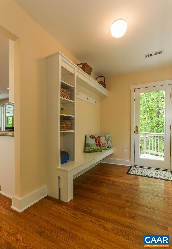 590 Explorers Road Charlottesville, VA 22911 - Photo 33 of 50 a view of an empty room with a window and wooden floor