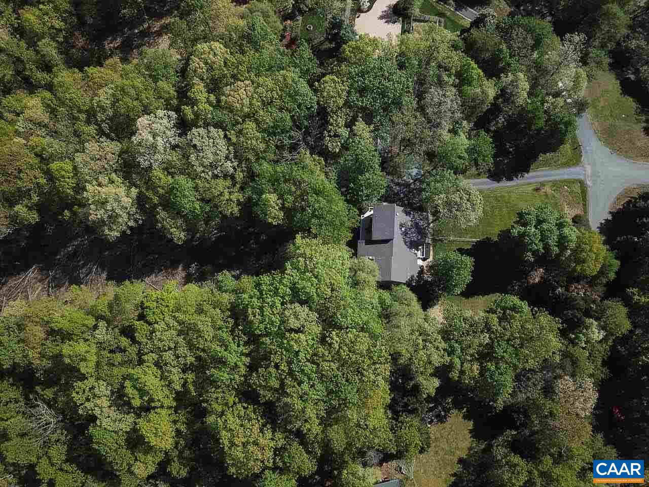 590 Explorers Road Charlottesville, VA 22911 - Photo 37 of 50 an aerial view of a house with a yard