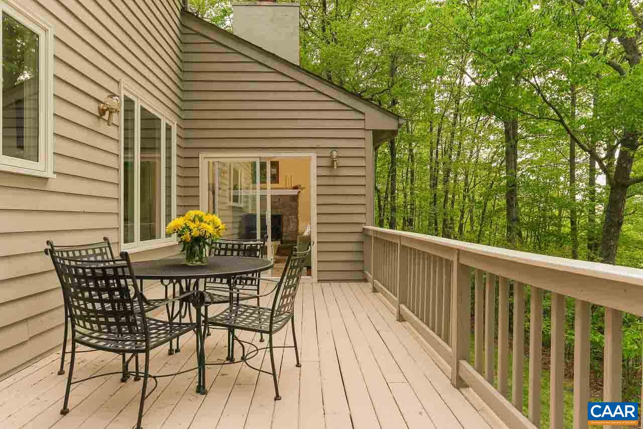590 Explorers Road Charlottesville, VA 22911 - Photo 6 of 50 a view of a wooden chairs and table in the balcony