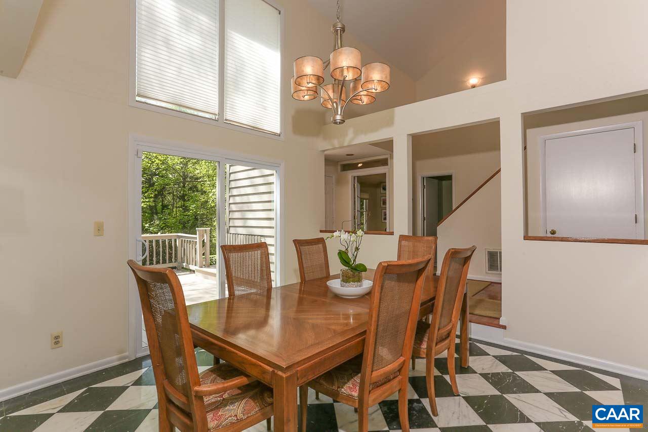 590 Explorers Road Charlottesville, VA 22911 - Photo 8 of 50 a view of a dining room with furniture and chandelier