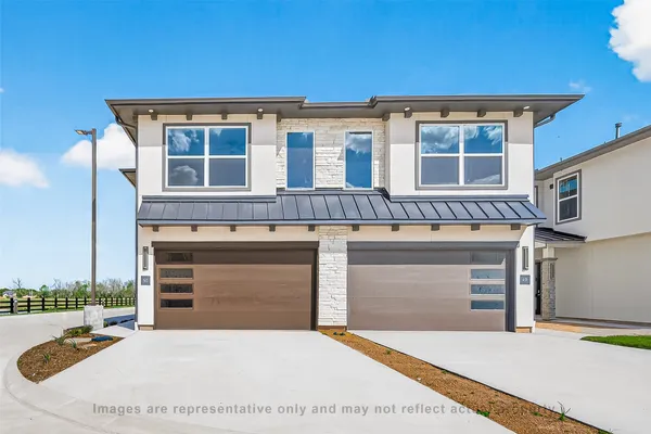 a front view of a house with entertaining space