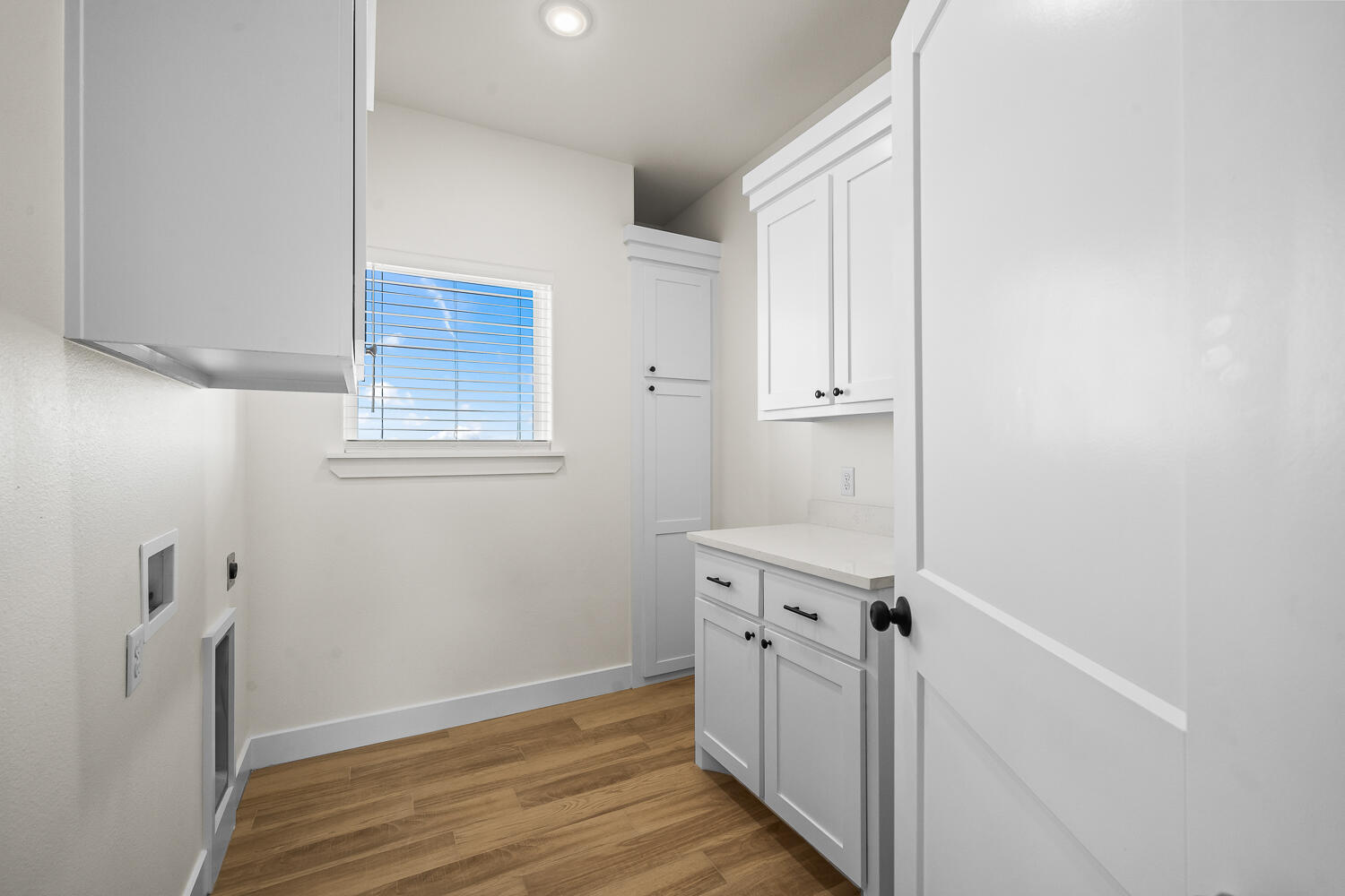 8115 County Road Shallowater, TX 79363 - Photo 14 of 47 a view of a room with wooden floor and cabinet