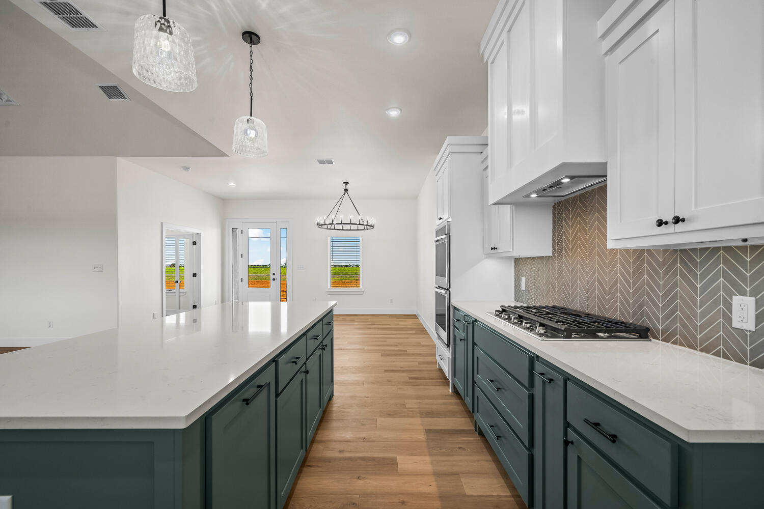 8115 County Road Shallowater, TX 79363 - Photo 18 of 47 a kitchen with stainless steel appliances a stove a sink a counter space and cabinets