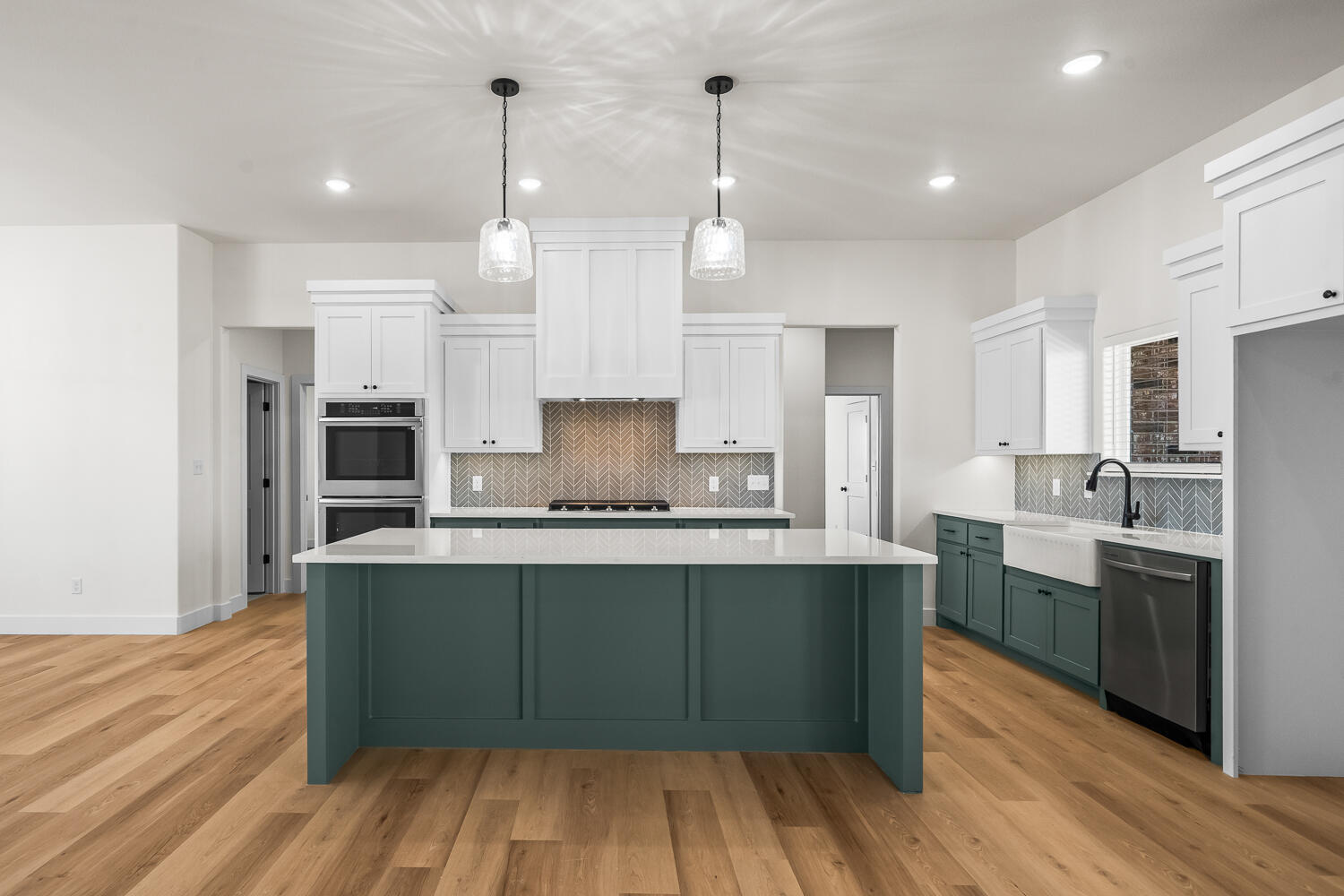 8115 County Road Shallowater, TX 79363 - Photo 21 of 47 a large kitchen with cabinets wooden floor and stainless steel appliances