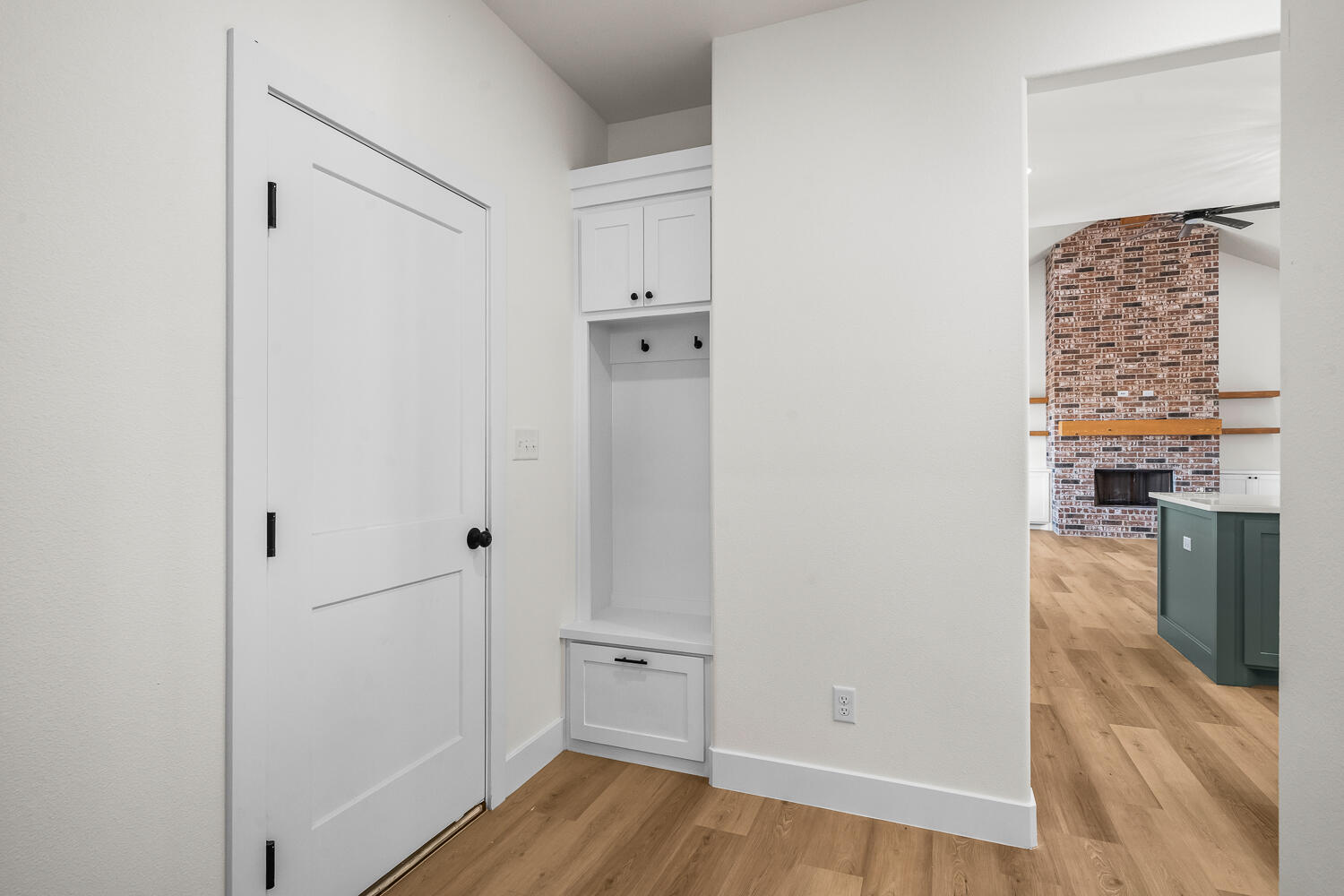 8115 County Road Shallowater, TX 79363 - Photo 38 of 47 a view of walk in closet with wooden floor