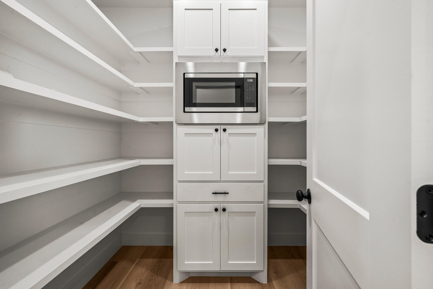 8115 County Road Shallowater, TX 79363 - Photo 47 of 47 a view of a livingroom with an empty space and wooden floor