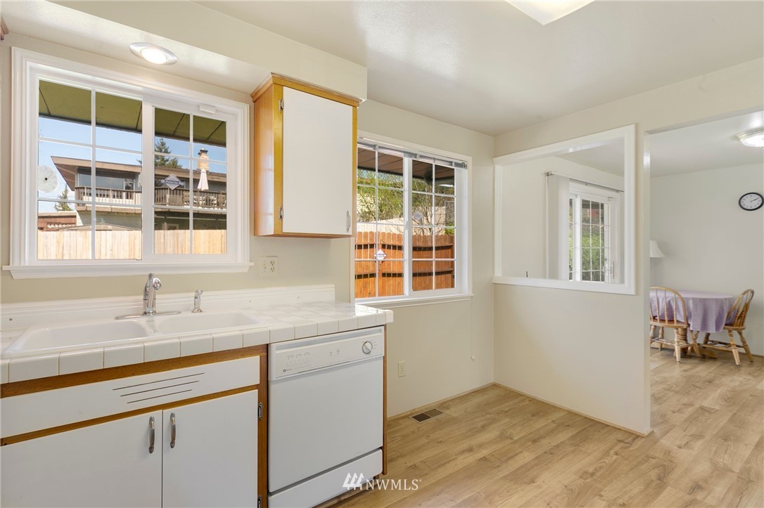 3322 Northeast 10th Place Renton, WA 98056 - Photo 11 of 21 a kitchen with a sink and a window
