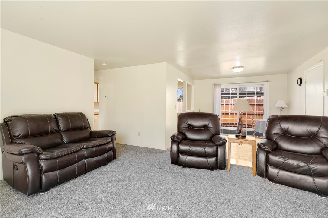 3322 Northeast 10th Place Renton, WA 98056 - Photo 6 of 21 a living room with furniture and hard wood flooring