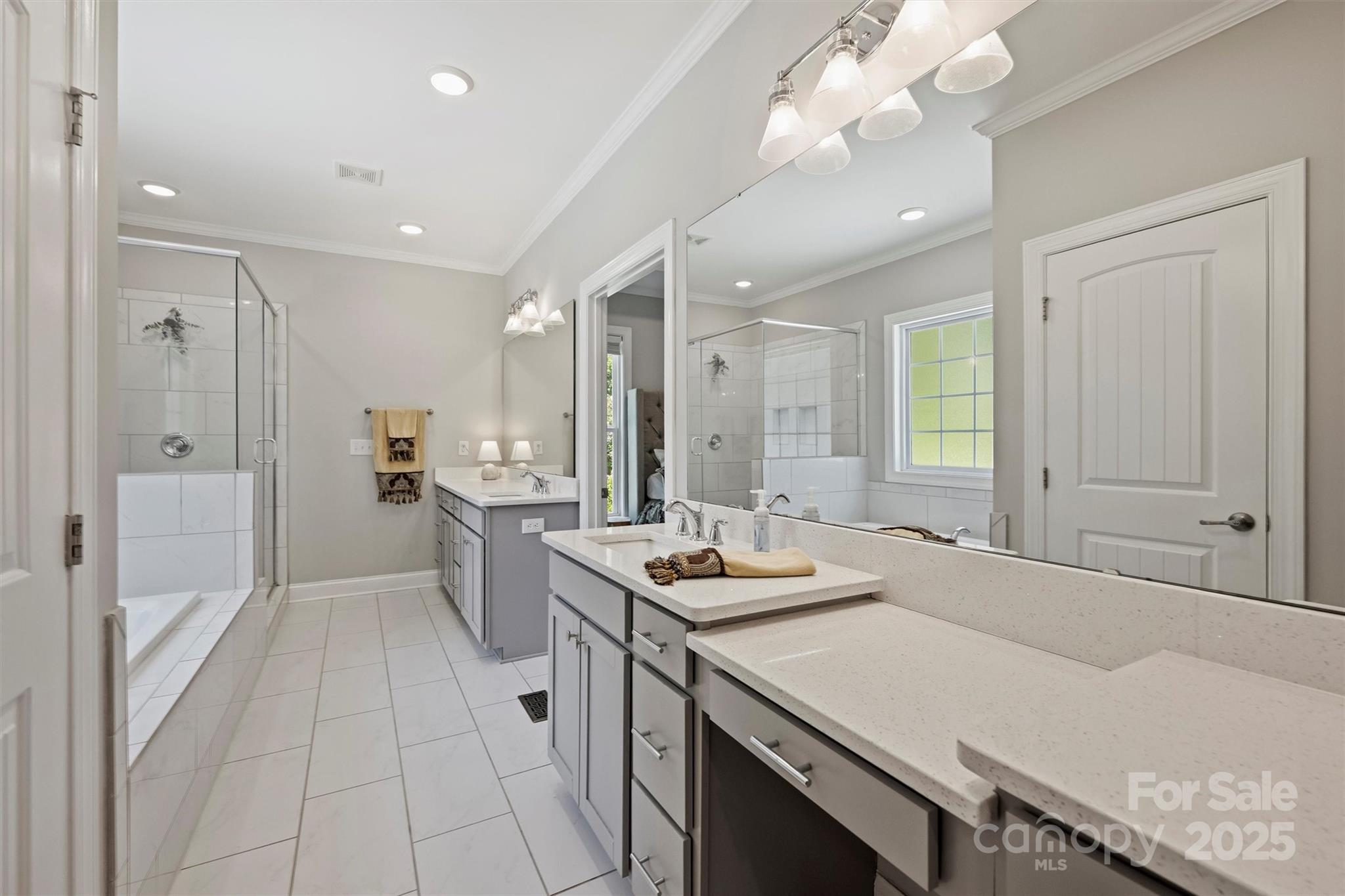 2413 Rocky River Road Charlotte, NC 28213 - Photo 12 of 46 a kitchen with a sink a stove a refrigerator and cabinets