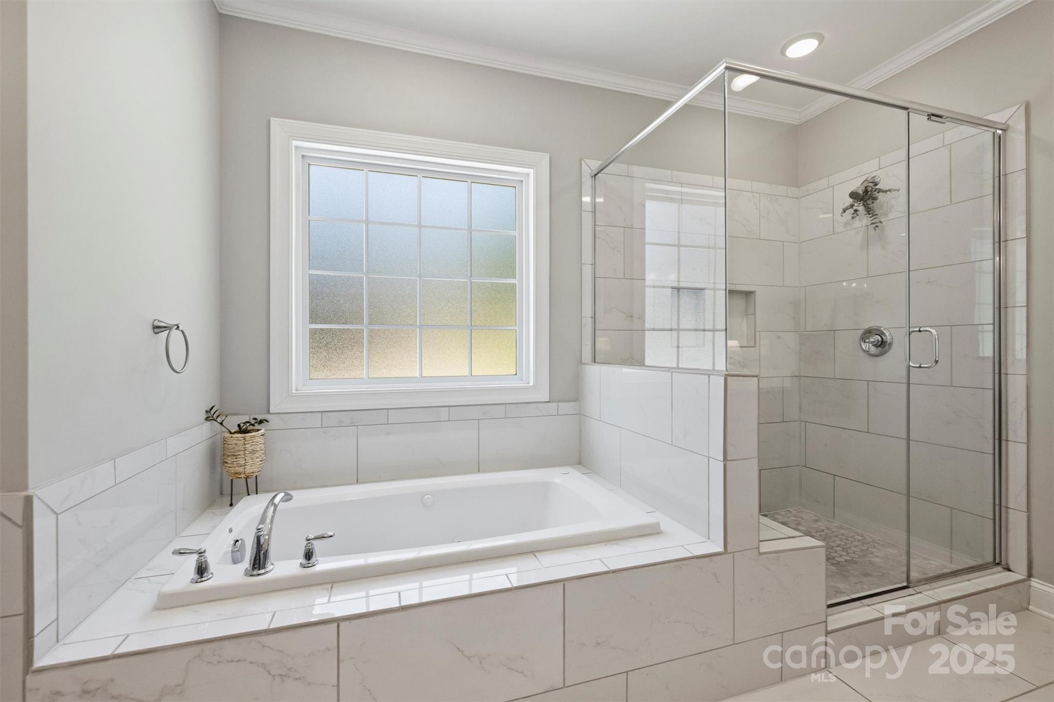 2413 Rocky River Road Charlotte, NC 28213 - Photo 14 of 46 a bathroom with a shower and a bathtub