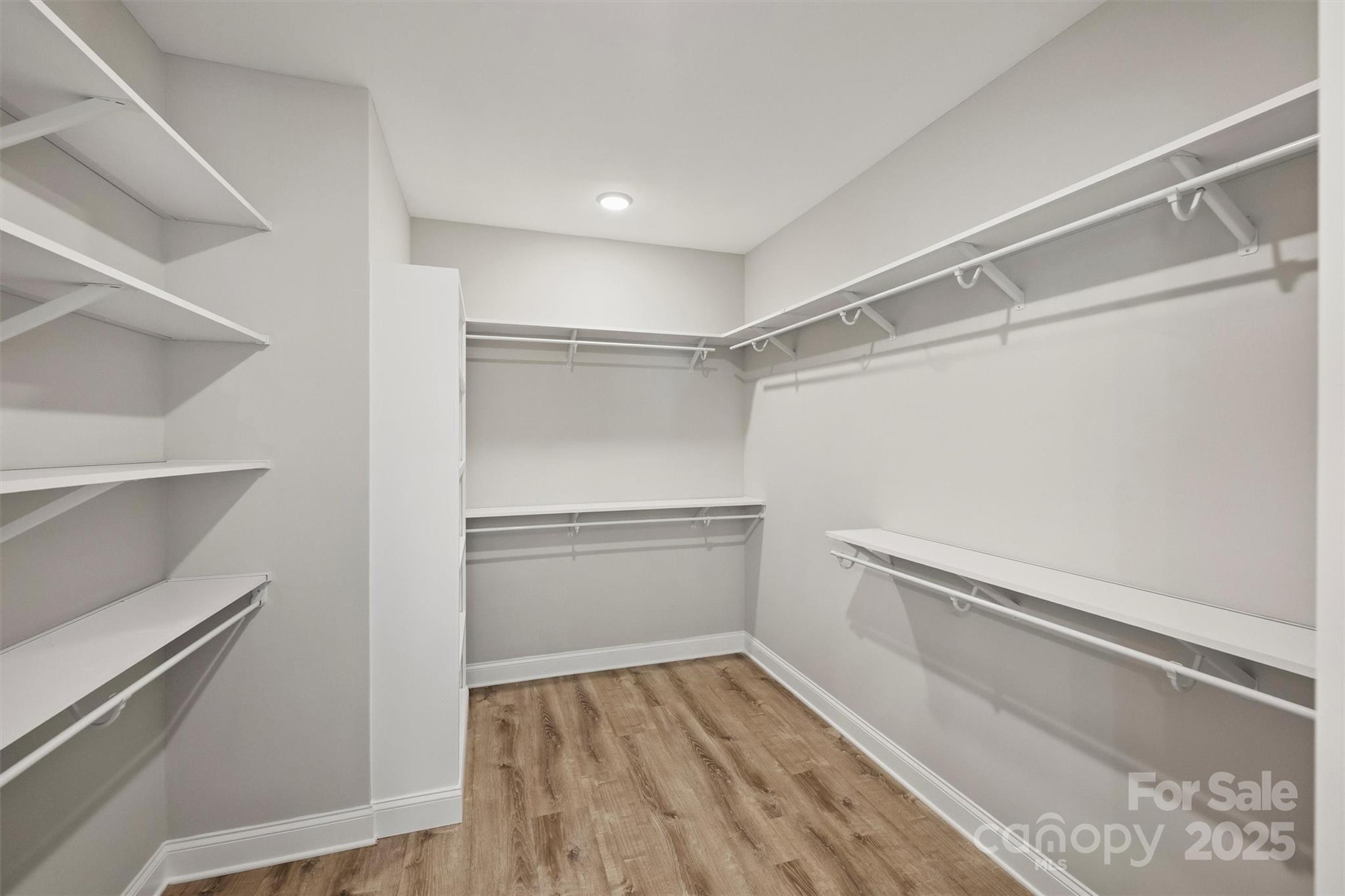 2413 Rocky River Road Charlotte, NC 28213 - Photo 15 of 46 a view of an empty walk in closet