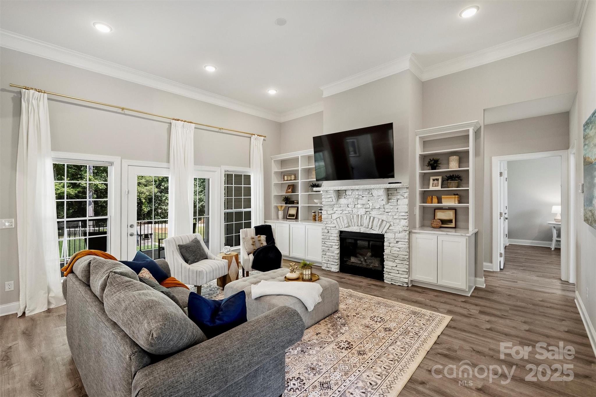 2413 Rocky River Road Charlotte, NC 28213 - Photo 2 of 46 a living room with furniture fireplace and flat screen tv
