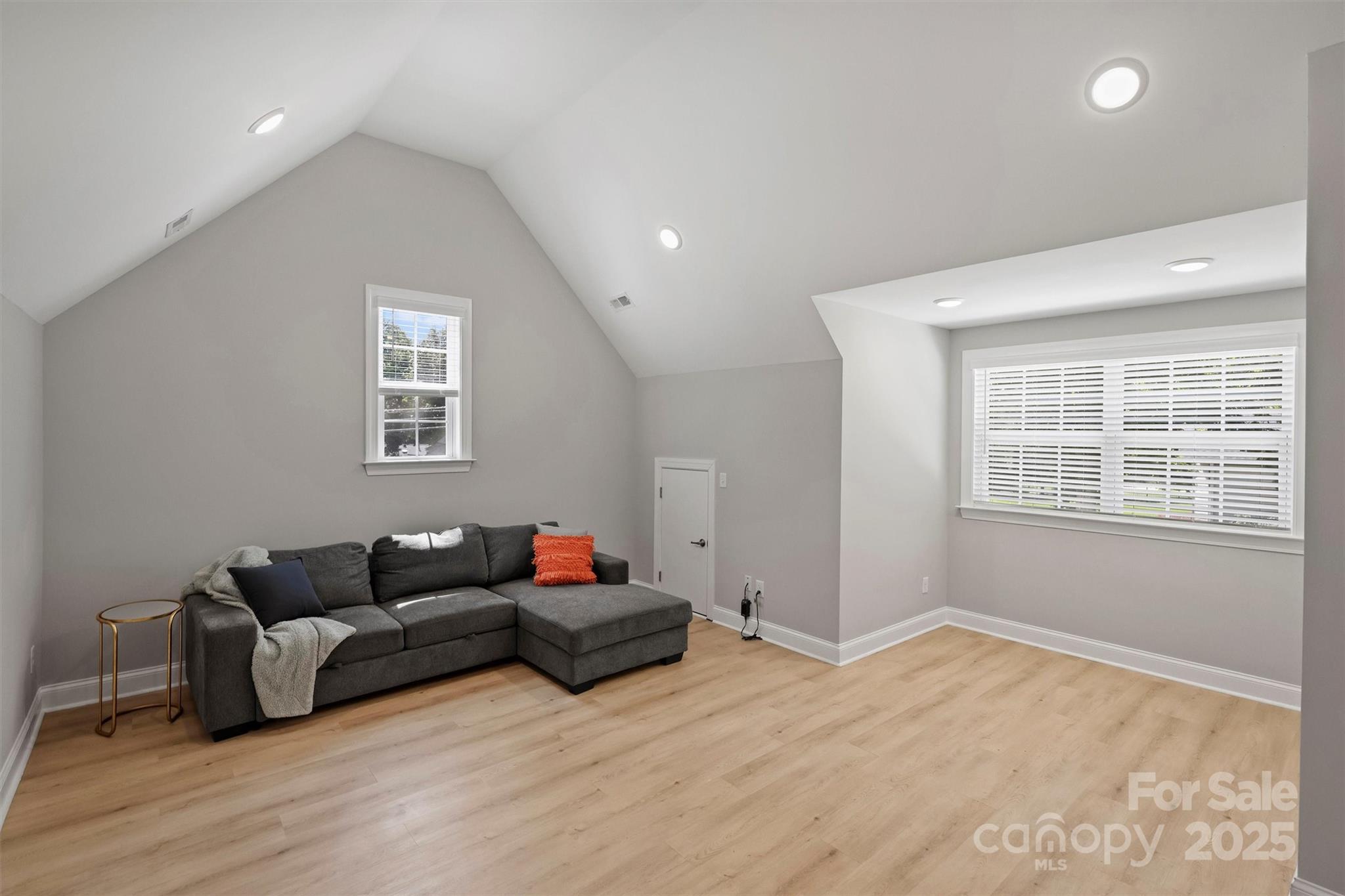 2413 Rocky River Road Charlotte, NC 28213 - Photo 21 of 46 a living room with furniture and a window