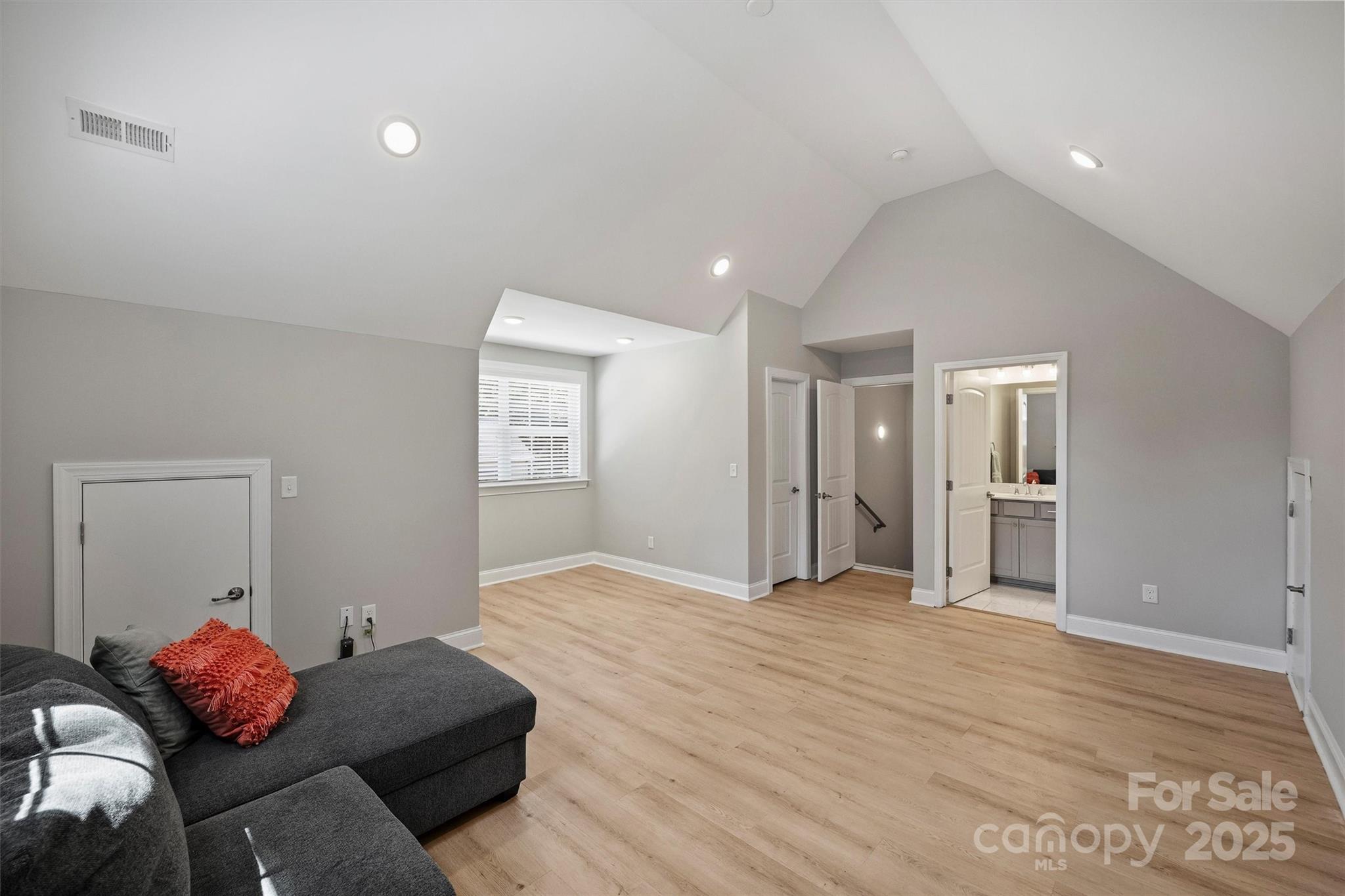 2413 Rocky River Road Charlotte, NC 28213 - Photo 22 of 46 a bedroom with furniture and a window