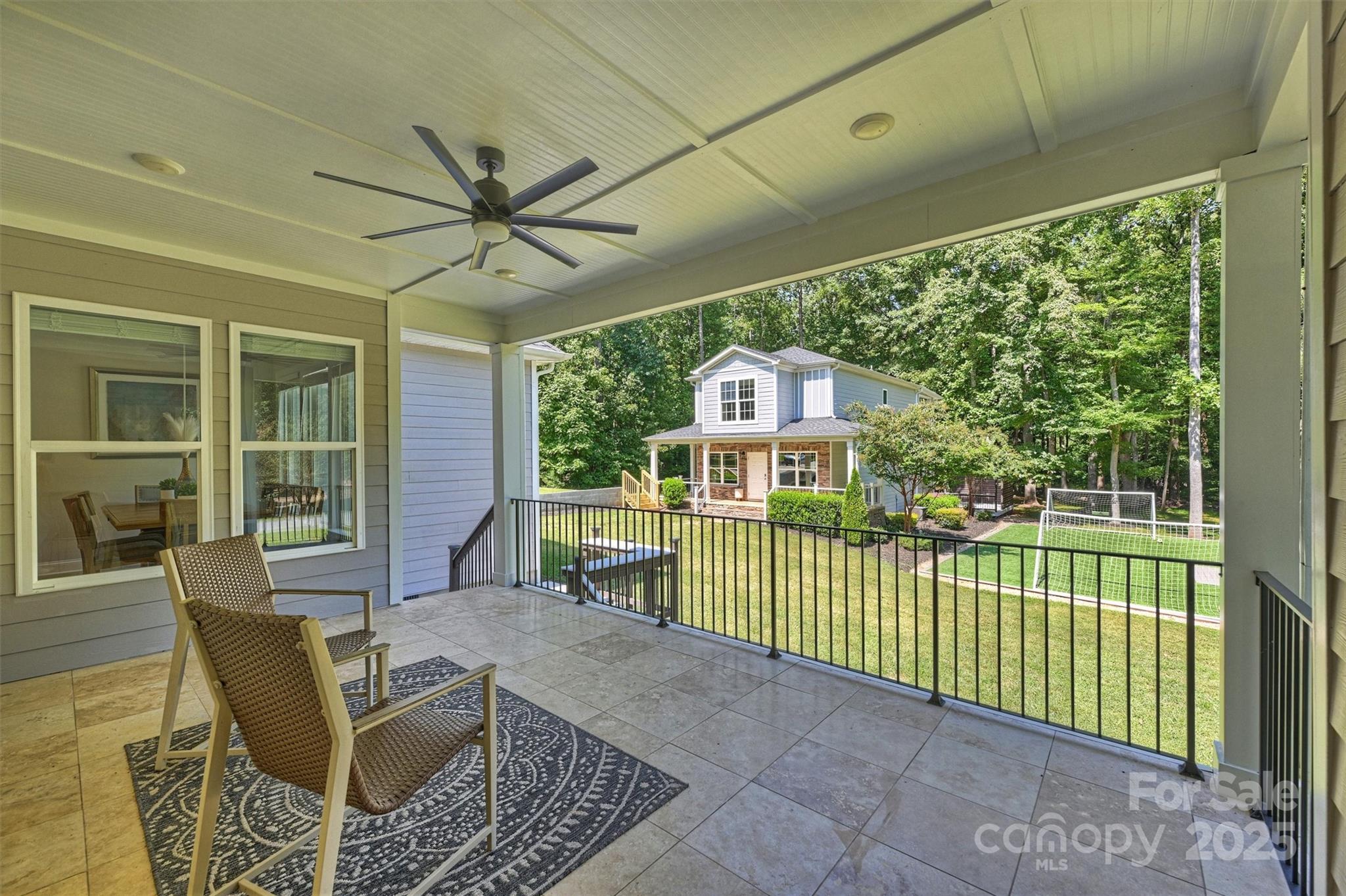 2413 Rocky River Road Charlotte, NC 28213 - Photo 25 of 46 a view of a porch with furniture and garden