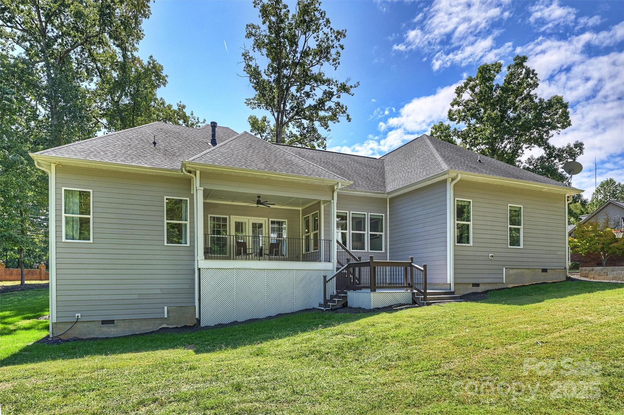 2413 Rocky River Road Charlotte, NC 28213 - Photo 27 of 46 a view of a house with a yard and sitting area