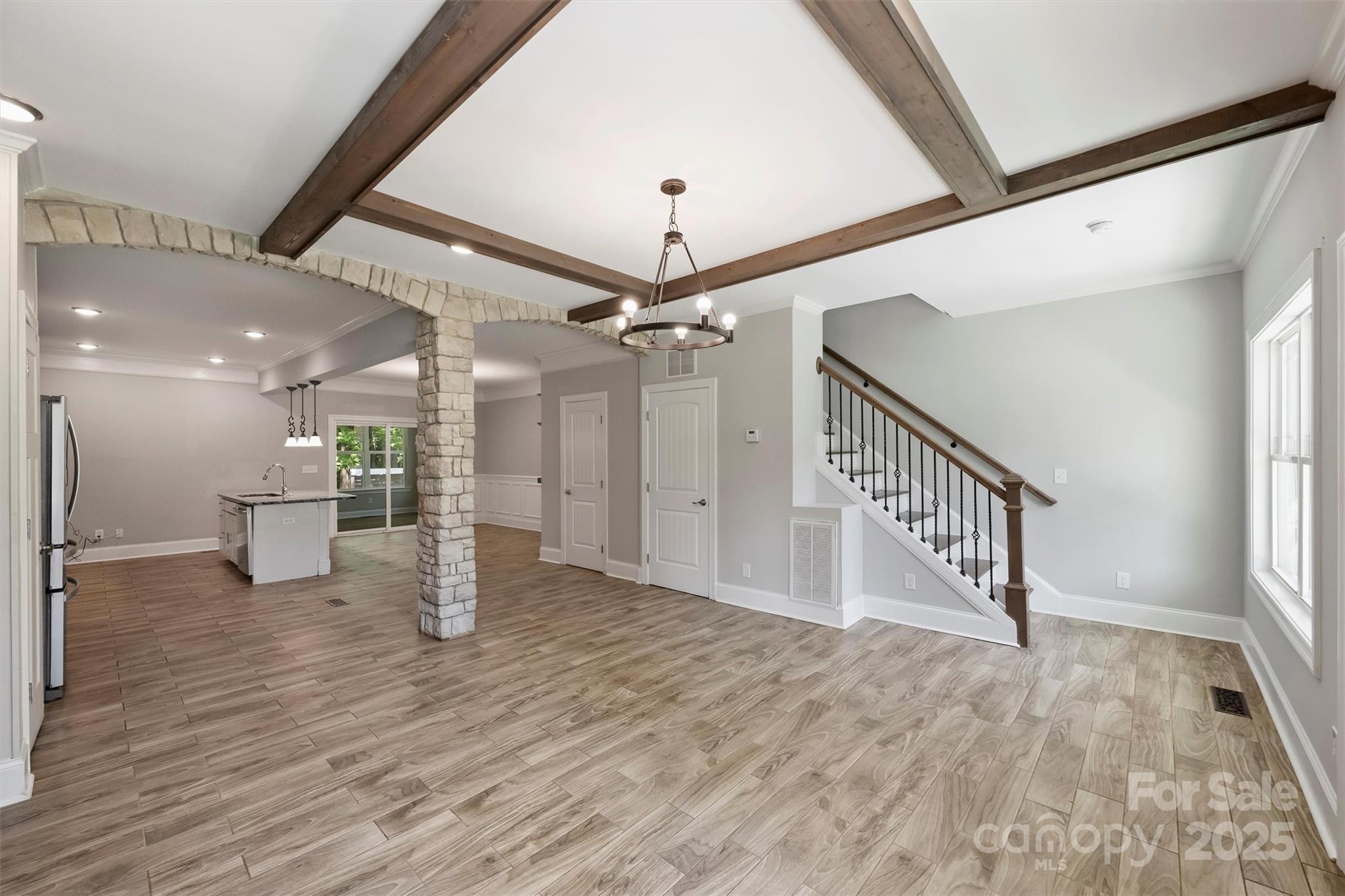 2413 Rocky River Road Charlotte, NC 28213 - Photo 30 of 46 a view of a hallway with a dining table chairs
