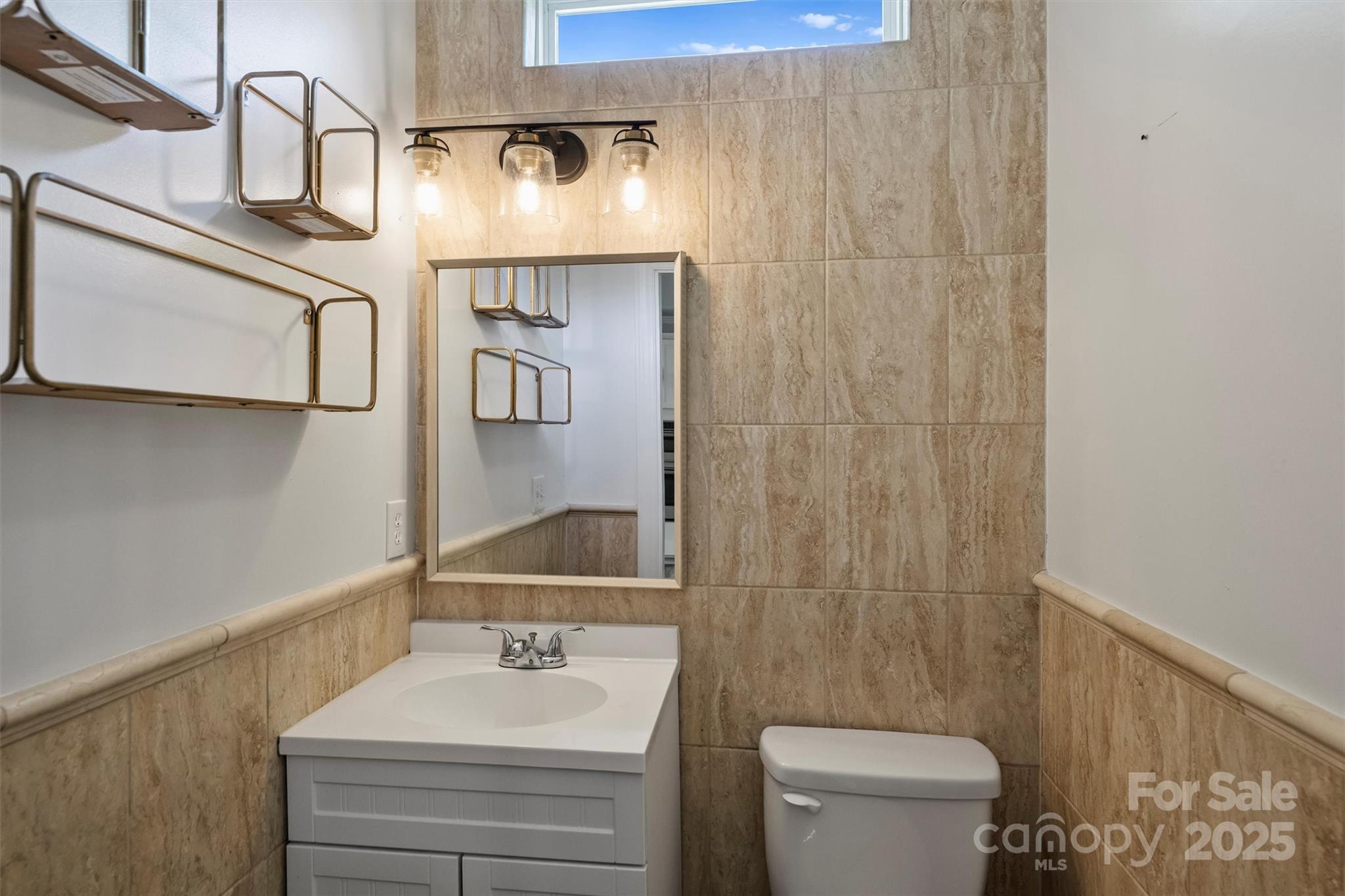 2413 Rocky River Road Charlotte, NC 28213 - Photo 35 of 46 a bathroom with a sink a toilet and shower