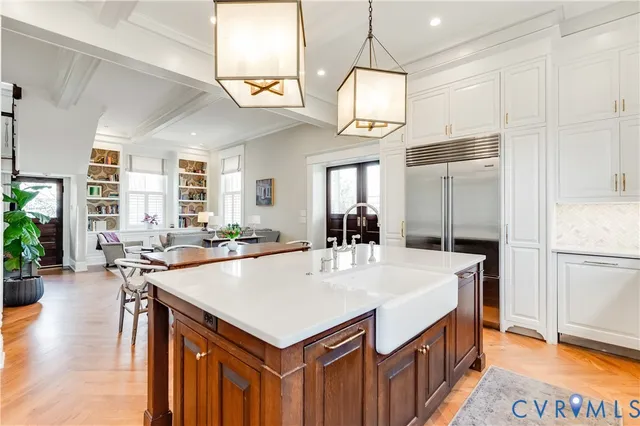 a workspace with wooden floor and a window