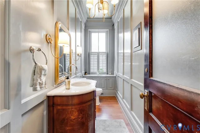 a room with a large window and a bed