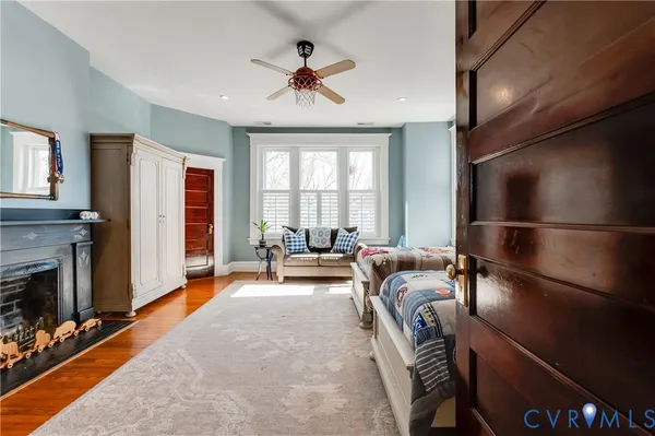 a view of hall way with furniture