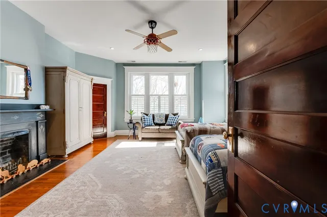 a view of hall way with furniture