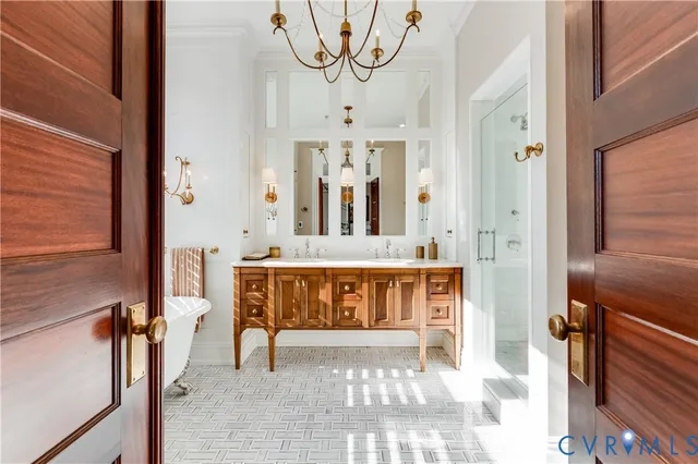 a spacious bedroom with a bed and a couch